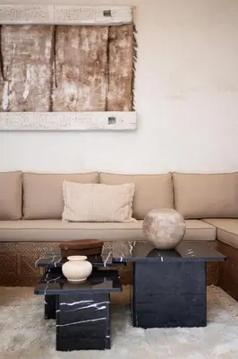 a living room with a couch and a table at Riad Kasbah Lover Swimming pool breakfast included in Marrakech