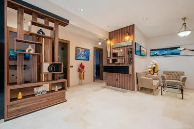 a living room with a couch and a chair at Central Luxury Gem marrakech 3BR in Marrakech