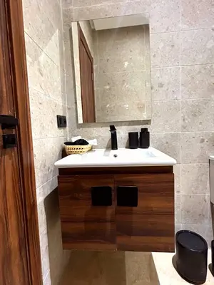 a bathroom with a sink and a mirror at Central Victor Hugo Studio near Gueliz Wi-Fi in Marrakech