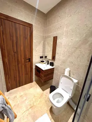 a bathroom with a toilet and a sink at Central Victor Hugo Studio near Gueliz Wi-Fi in Marrakech