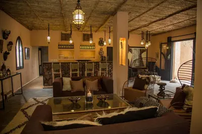 a large living room with couches and a table at Fawakay Villas in Sfiani