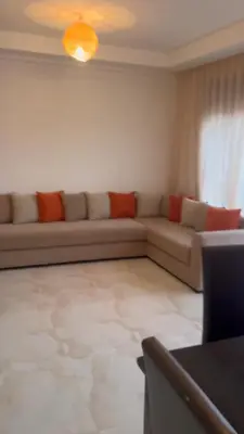 a living room with a couch in a room at appartement Marrakech in Marrakech
