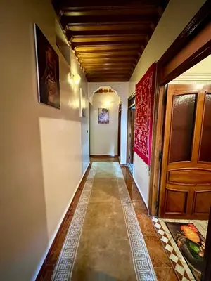 a hallway of a house with a door at Appartement Kech in Marrakech