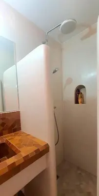 a bathroom with a shower with a glass door at Riad Keke 4 suites - Pool&Rooftop - Bahia in Marrakech