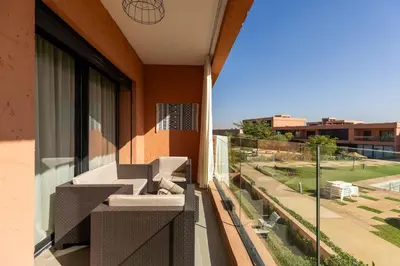 a balcony of a building with a view of a street at Atlas Luxury Escape Golf Noria Pool & Quiet in Marrakech
