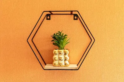 a small plant in a vase on a wall at Atlas Luxury Escape Golf Noria Pool & Quiet in Marrakech