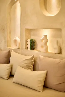 a bunch of vases and vases sitting on shelves at Luxury Private Riad - Pool - Breakfast Included in Marrakech