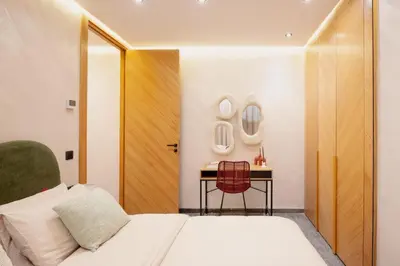 a bedroom with a bed and a table at Cocooning escape Relaxation, design and serenity in Marrakech