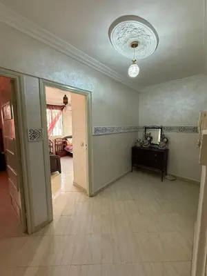 an empty room with a hallway with a ceiling at Modern Flat Gueliz ,City center Marrakech in Marrakech