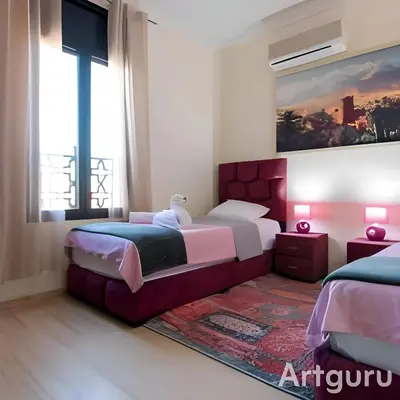 a bedroom with two beds and a large window at Villa Familiale, Piscine et jardin privés, proche du centre ville in Marrakech
