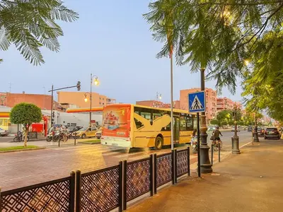 a bus is parked on a city street at Secure Stylish Flat Gueliz Pool WiFi Parking in Marrakech