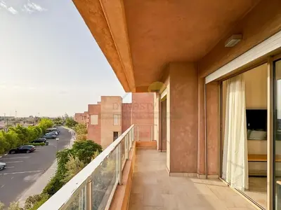 an apartment balcony with a view of a street at Elegant Studio-Prestigia Agate in Marrakech