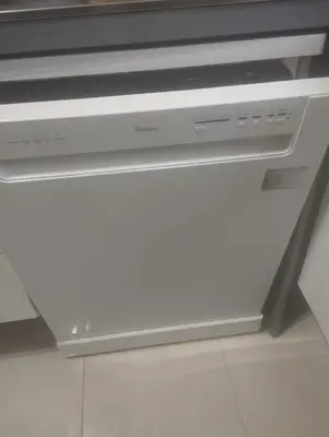 a dvd player sitting on top of a tv at Cocon chaleureux proche commerces et centre in Marrakech