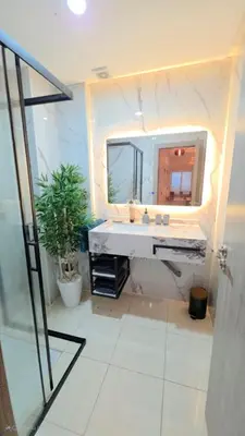 a bathroom with a sink and a mirror at Cocon Zen in Marrakech