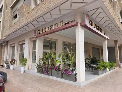 a store front with flowers and plants in front of it at Cocon Zen in Marrakech