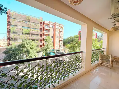 a balcony with a view of a building at Escapade Gueliz - Central & parking Privé in Marrakech