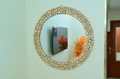 a mirror on a wall with a fire hydrant at Stylish apartment, 5 min to airport fiber&Netflix in Marrakech