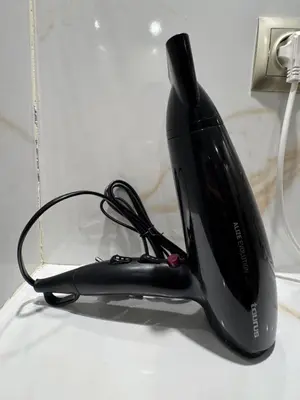 a black iron sitting on top of a counter at City Luxe Studio in Marrakech