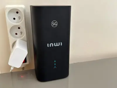 a wii remote sitting next to an electrical outlet at Appartement de luxe dans le centre de Marrakech in Marrakech