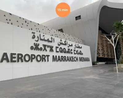 a building with a sign for aazport marriott namespace at 5-Star Duplex - Private Pool in Marrakech