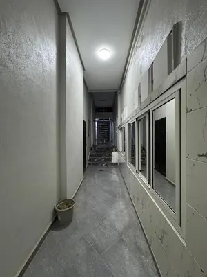 an empty hallway of a building with a hallway at 2 bedroom apartment in a perfect location in Marrakech