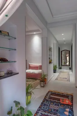 a living room with a couch and a rug at Dar Choway Ground Floor Apartment in Marrakech