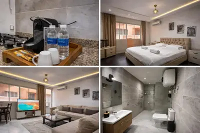 a hotel room with a bed and a bathroom at Studio Chic & Haut Standing - Parking Gratuit in Marrakech