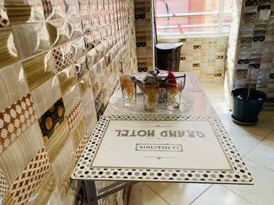 a table in a store with glasses on it at Moroccan-style apartment rental in Marrakech in Marrakech