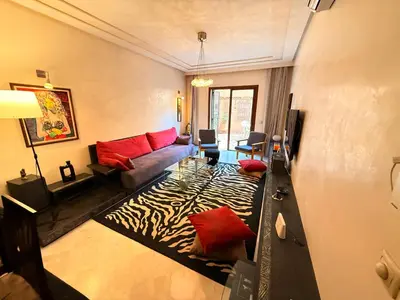 a living room with a couch and a zebra rug at Gueliz 2 BR Duplex - Terrace - Wi-Fi - Train station in Marrakech