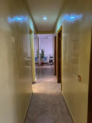 an empty hallway with blue lights in a room at Appartement Marrakech Gueliz in Marrakech