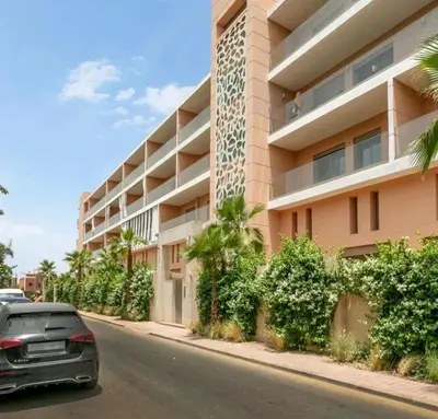 a car parked in front of a building at Elegant duplex Marrakech in Marrakech