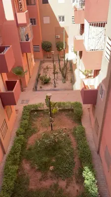 an aerial view of a courtyard in a building at Apartment near Mènera gardens and city center in Marrakech
