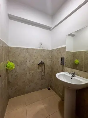 a bathroom with a sink and a shower at Apartment in Marrakech near McDonald's Massira in Marrakech