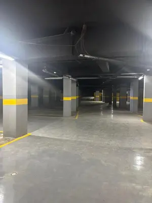 an empty parking garage with an empty parking lot at New apartment - Gueliz - Pool in Marrakech