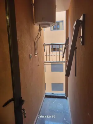 a view of a swimming pool in a room with a balcony at City Chic New build Apartment in Marrakech