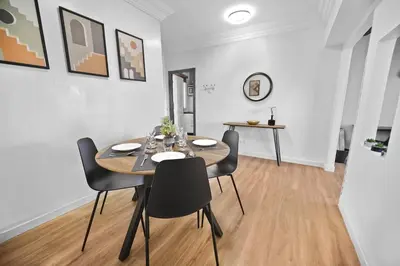 a dining room with a table and chairs at Centre Town Cozy Apartment with Panoramic View in Marrakech