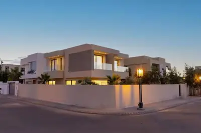 a building with a street light in front of it at Momiji Golf Villa - Private Heated Pool in Marrakech
