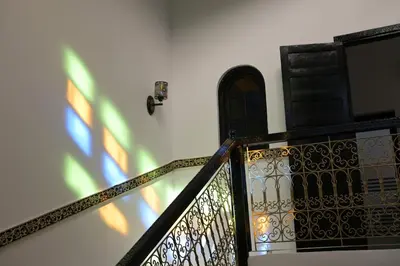 a staircase with a door and a window on a building at Riad Marrakech Golden Star 82 with 3 Rooms & Pool in Marrakech