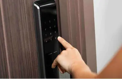 a persons hand is pointing at a door knob at 3 BED Hidden Gem Self Check-in With Pool M6 BLVD in Marrakech