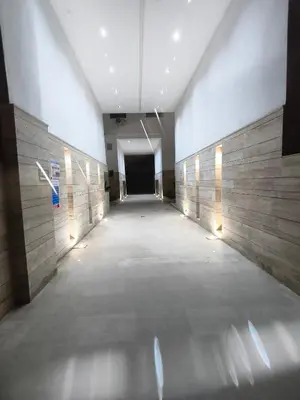 a hallway in a building with a tunnel at Studio a Menara garden in Marrakech
