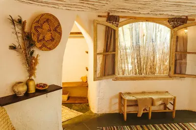 a room with a window and a table in a room at Oasis Garden Marrakech in Marrakech
