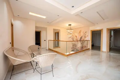 a dining room with a glass table and chairs at Villa Soliya 4 Rooms with private pool in Marrakech