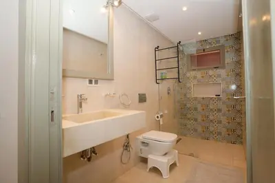 a bathroom with a sink and a toilet at Maison M, Spacious 2-Bedroom Apartment in Marrakech in Marrakech