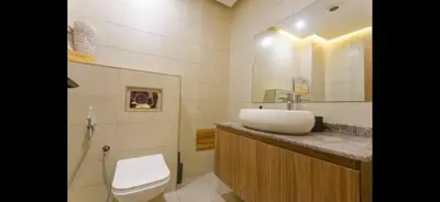 a bathroom with a sink and a toilet at Modern 3-Bed retreat in Gueliz near Train station in Marrakech
