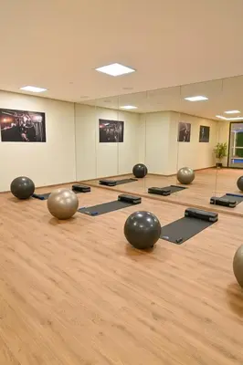 an empty room with yoga balls on the floor at Syra House Residence Moderne 2 Piscine Jacuzzi Parking in Marrakech