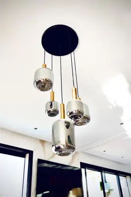 a group of lights hanging from a ceiling at Luxury Villa Hedi in Marrakech