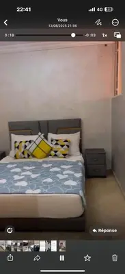 a screen shot of a bedroom with a bed at Atlas view apartement in Marrakech