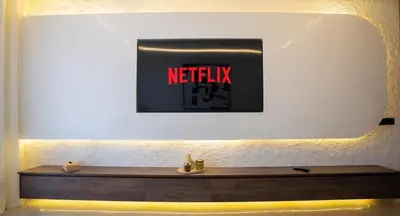 a sign with the word netflix on a wall at New Apartment in Gueliz with Private Terrace in Marrakech
