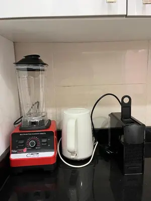 a blender and a toaster sitting on a counter at Garden Apartment 5 min from Gueliz in Marrakech