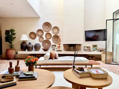 a living room with a couch and a table at Dar 43 with Private Pool Breakfast Included in Marrakech